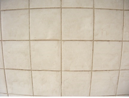 油汚れでベタベタになったキッチンタイル